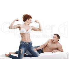Image of athletes fooling around in bed