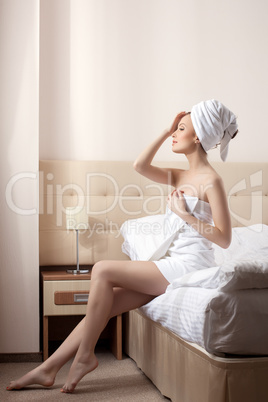 Lovely woman resting after taking bath