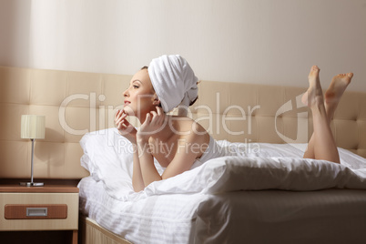 Image of sensual woman resting after taking bath