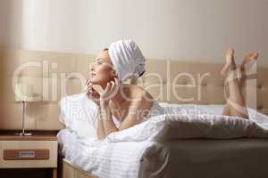 Image of sensual woman resting after taking bath
