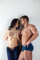 Image of curvy topless brunette and handsome macho