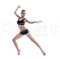 Sexy blonde posing in elegant dance pose