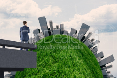 Composite image of businessman looking away