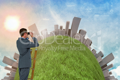 Composite image of businessman looking on a ladder