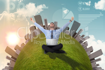 Composite image of businessman sitting on the floor cheering