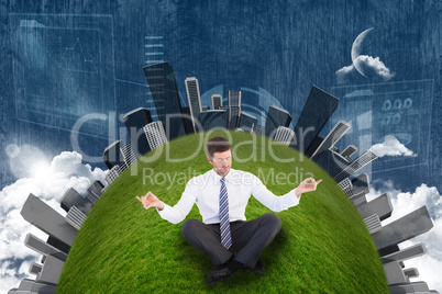 Composite image of businessman in suit sitting in lotus pose