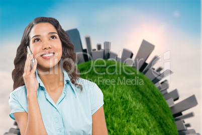 Smiling businesswoman using smart phone while looking up
