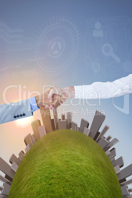 Composite image of business people shaking hands on white backgr