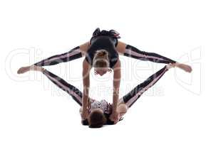 Acrobatics. Girls in difficult stretching pose