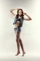 Image of cute teen model posing in jeans clothes