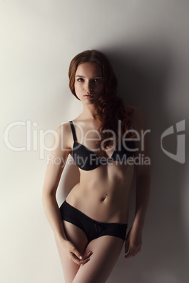 Attractive brown haired model advertises underwear