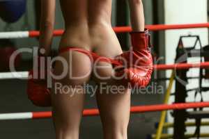 Elastic ass of sexy female boxer, close-up