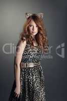 Shot of babe in leopard print dress and cat ears
