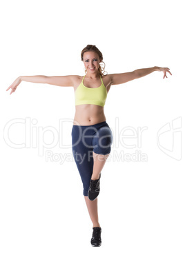 Happy sporty model posing at camera during workout