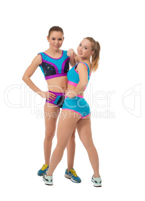 Pretty young female athletes posing at camera
