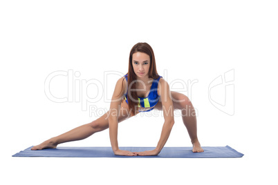 Pretty girl exercising pilates, isolated on white