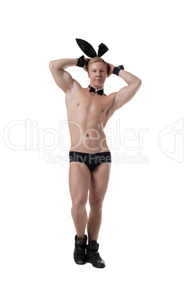 Image of strong macho posing in sexy bunny suit