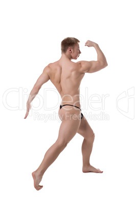 Bodybuilder posing at camera, isolated on white