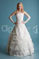 Image of smiling model touts elegant wedding dress