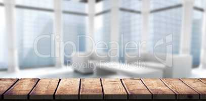 Composite image of wooden desk