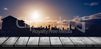 Composite image of wooden desk