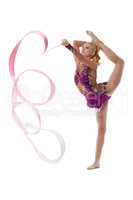 Graceful artistic gymnast performs with ribbon