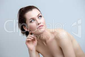 Portrait of pretty nude woman with natural makeup
