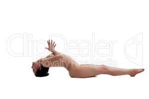 Side view of graceful naked girl doing yoga