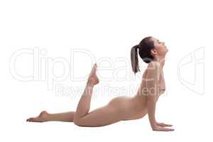 Building perfect body. Nude woman warming up