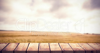 Composite image of wooden desk Composite image of wooden desk