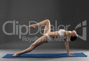 Image of yoga instructor exercising in studio