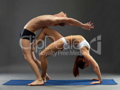 Yoga. Sensual composition of flexible athletes