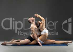 Yoga composition of athletes posing at camera