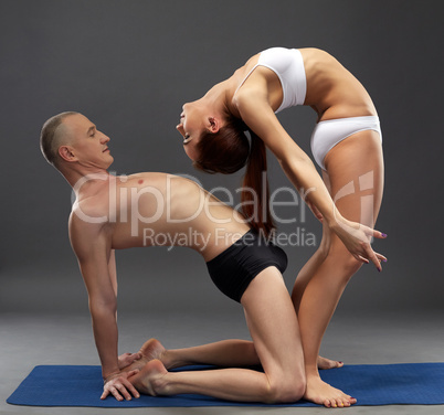 Image of flexible athletes. Yoga sessions in pair