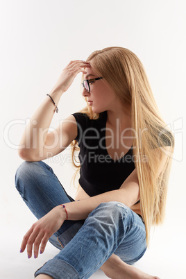 Sexy blonde wearing glasses, isolated on white