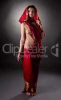 Mehndi. Charming model posing semi-nude in sari