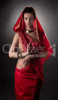 Sensual East woman dressed in sari. Mehndi art