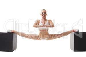 Erotic sport. Sexy girl doing gymnastic split