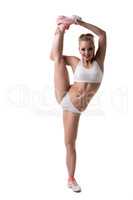 Gymnastic. Cute flexible girl posing at camera