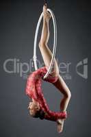 Image of flexible dance performer on aerial hoop