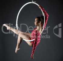 Image of sexy acrobatic girl posing with hoop