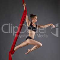 Image of beautiful dance performer on aerial silks