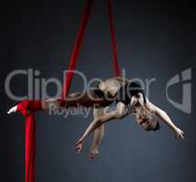 Image of elegant girl doing acrobatic trick