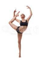 Attractive young dancer posing in graceful pose