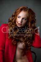 Beautiful brown-eyed model with luxurious red hair