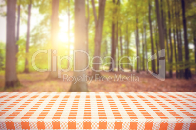 Composite image of orange and white tablecloth