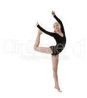 Sweet little gymnast posing in graceful posture
