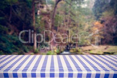 Composite image of blue and white tablecloth