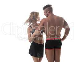 Athletic couple. Muscular man and pretty blonde
