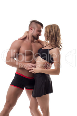 Studio photo of happy couple athletes